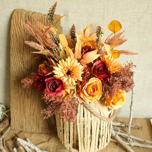 Display for orange artificia fall flower bouquet.
