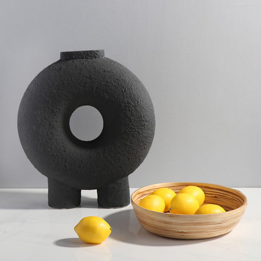 Display for B creative circular hollow ceramic vase.