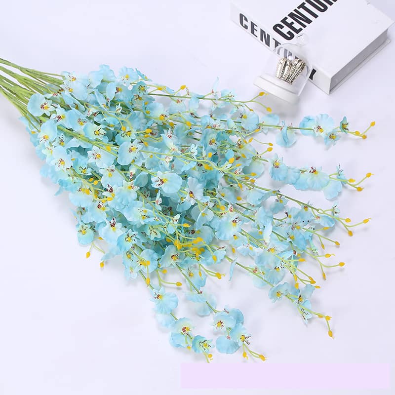 Display for blue dancing orchid artificial flower.