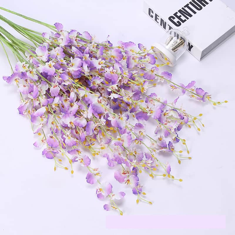 Display for purple dancing orchid artificial flower.