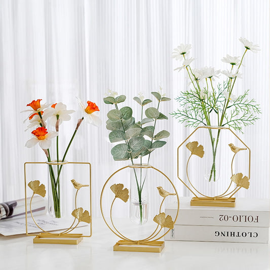 Display for round and square and hexagon glass tube vase with creative ginkgo biloba metal holder.