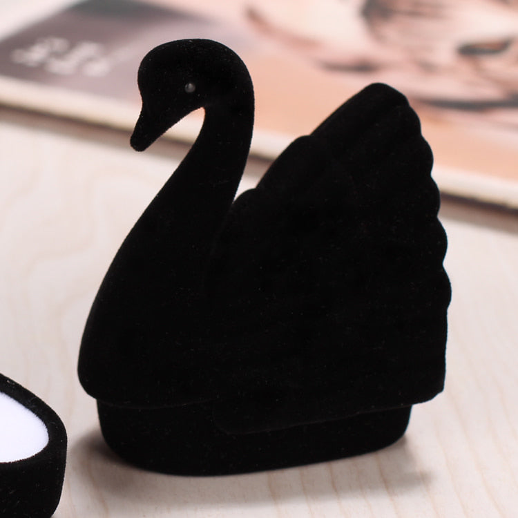 Lovely black swan flannel ring box.