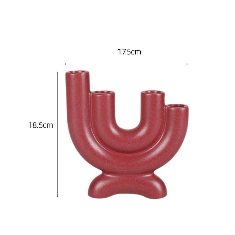 Display for fuchsia 4 holes modern ceramic tube candle holder.