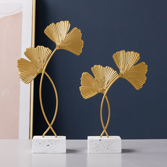 Display for small and large simple ginkgo leaf ornaments.