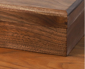 Detail for black walnut simple wooden snap on jewelry box.