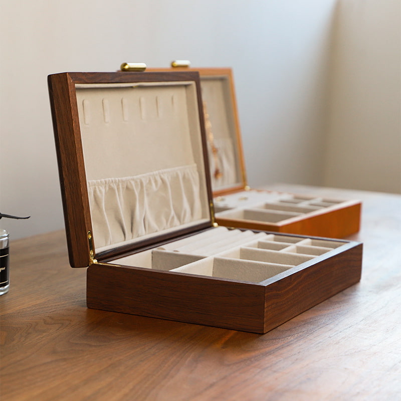 Display for black walnut and cherry wood simple wooden snap on jewelry box.