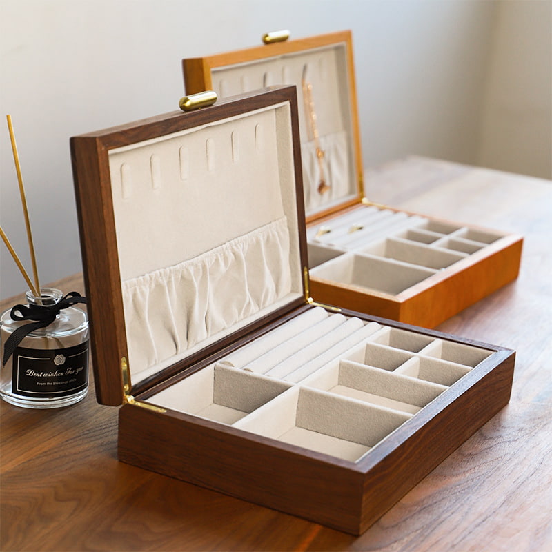 Display for black walnut and cherry wood simple wooden snap on jewelry box.