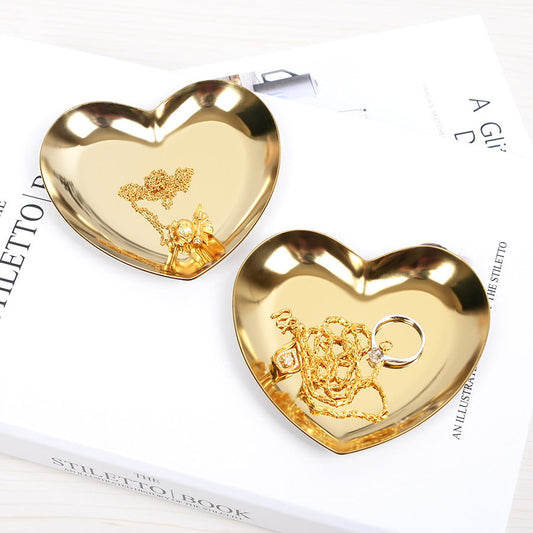 Gold stainless steel heart-shaped jewelry trays display.