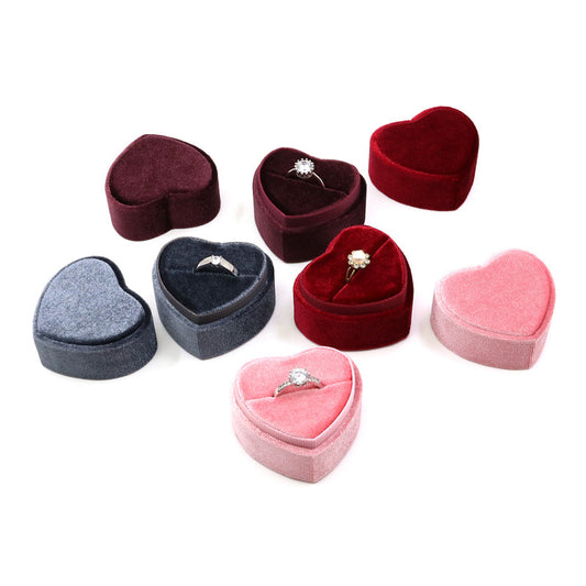 Display for sweet heart velvet ring box with single slot.