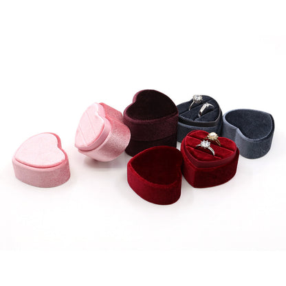 Display for sweet heart velvet ring box with single slot.