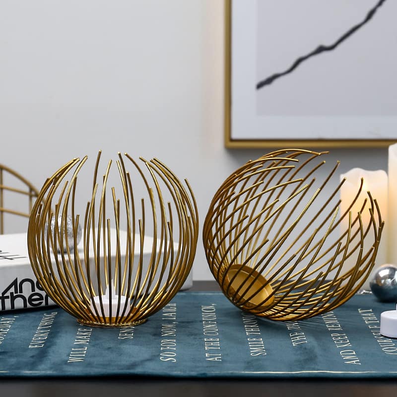 Display for gold twigs metal candle holder.