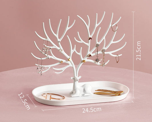 White antlers tree with white base jewelry stand tower.