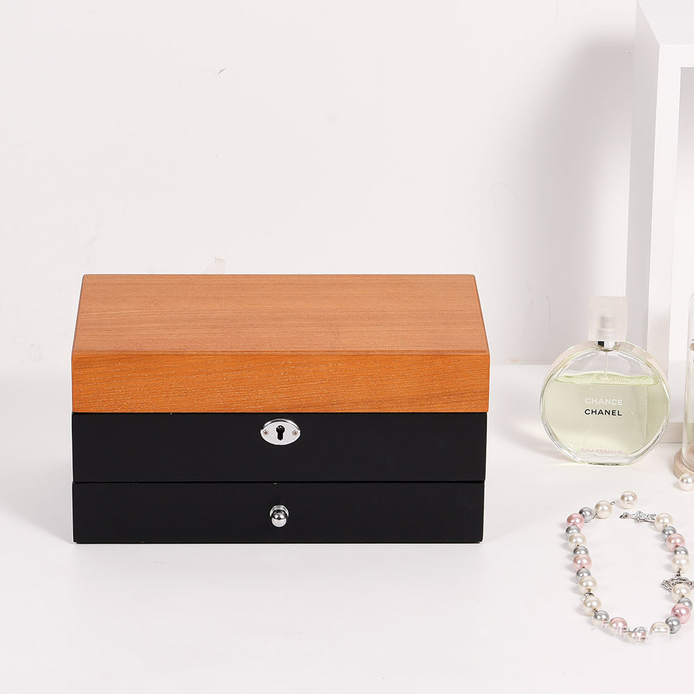 Exterior for black chic wooden jewelry box with lock and key.
