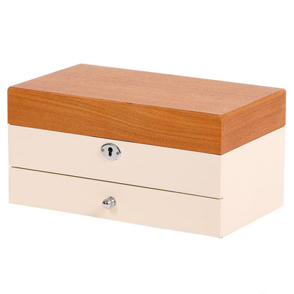 Display for white chic wooden jewelry box with lock and key.