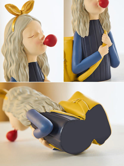 Details for yellow girl with a backpack resin pen holder.
