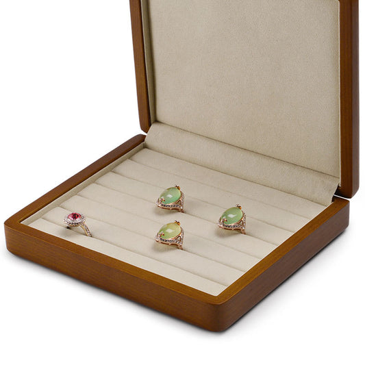 Display for graceful wooden jewelry box with microfiber.