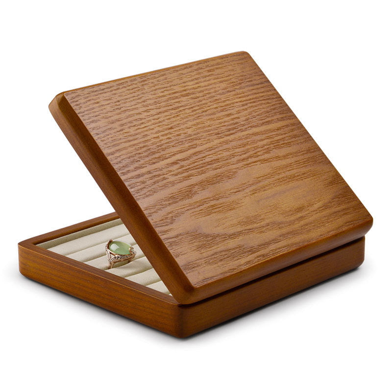 Display for graceful wooden jewelry box with microfiber.