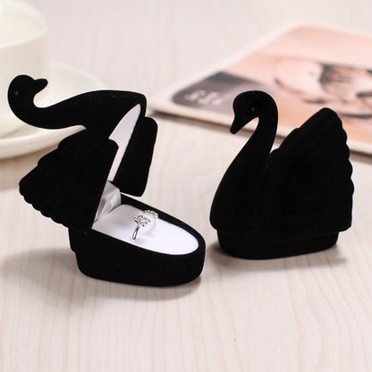 Lovely black swan flannel ring box.