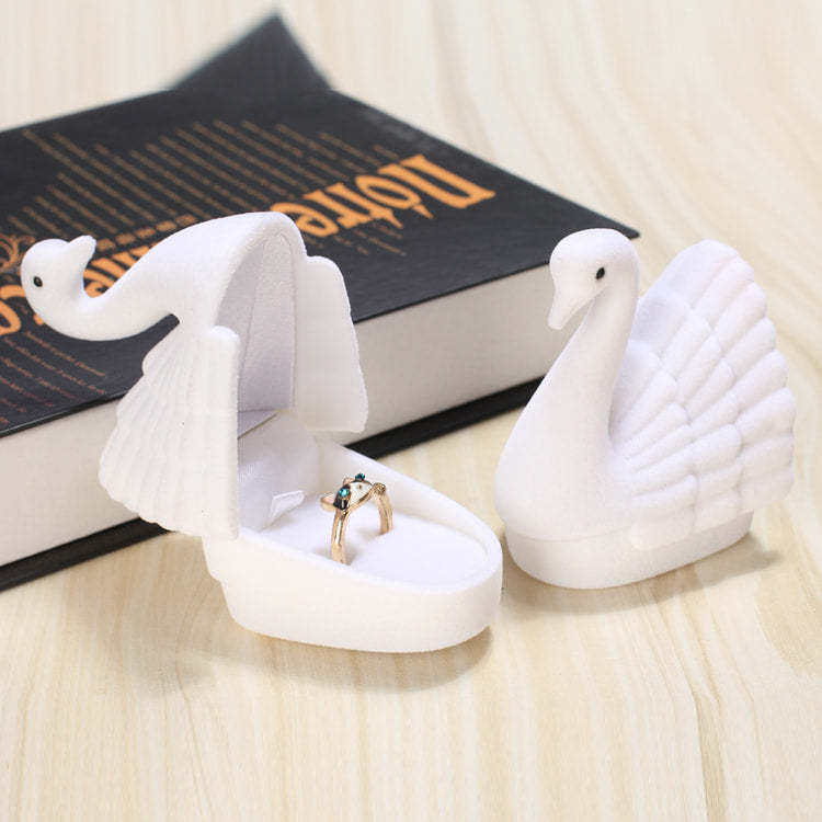 Lovely white swan flannel ring box.