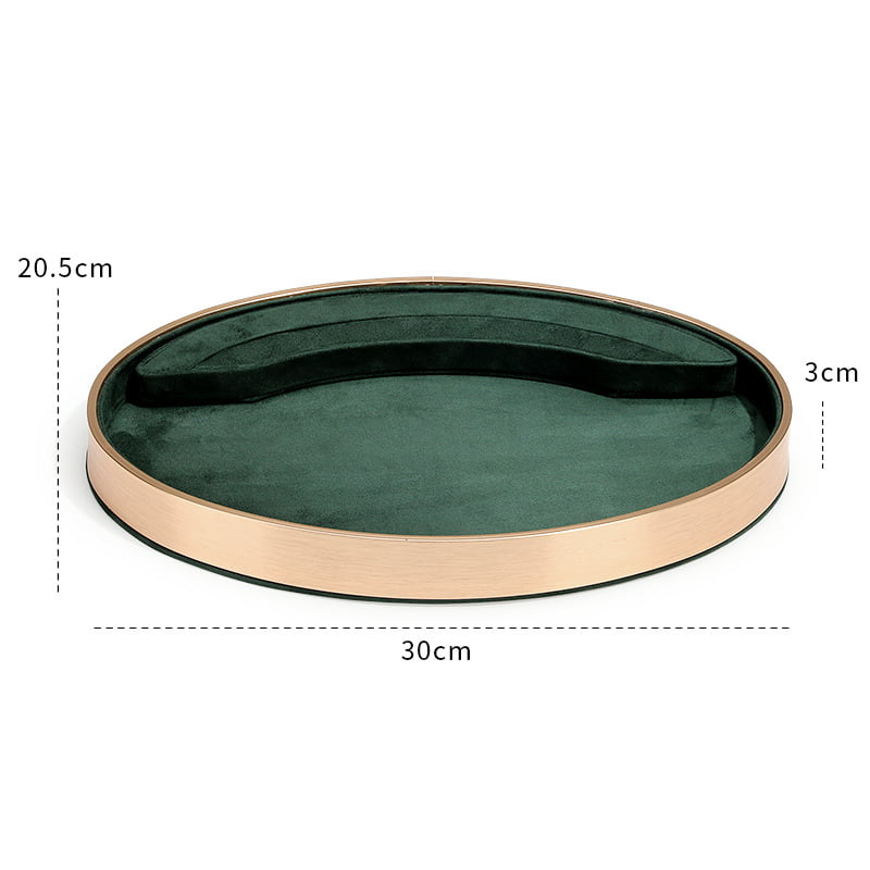 Green suede with gold metal base oval jewelry tray.