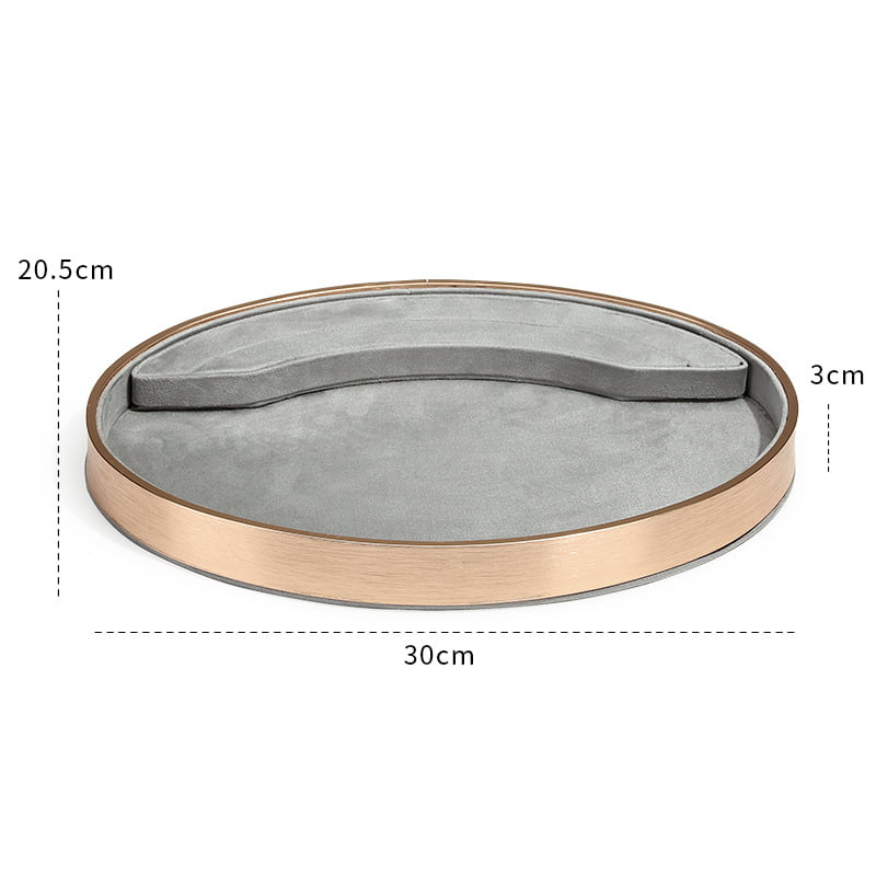 Grey suede with gold metal base oval jewelry tray.