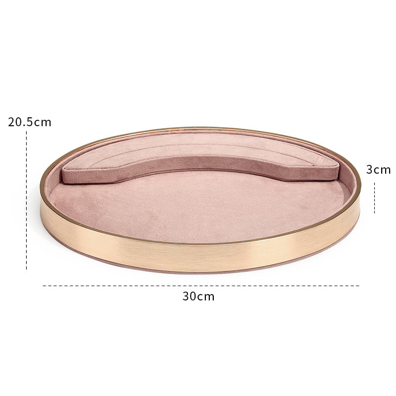 Pink suede with gold metal base oval jewelry tray.