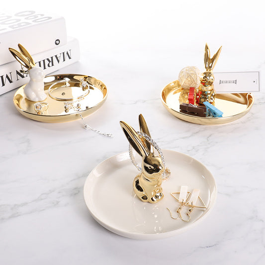 There are three different rabbit shaped jewelry trays.