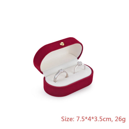 Red pair of wedding proposal ring box.