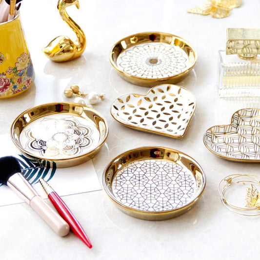 Display for porcelain round and heart with pattern jewelry trays.