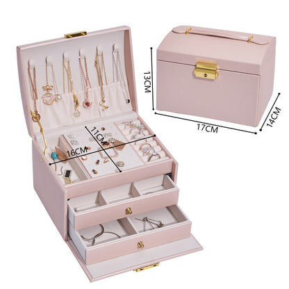 Pink Jewelry box with handle, this one is made of PU leather and velvet.