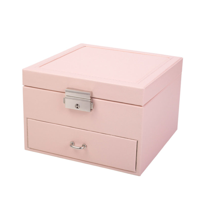 Exterior for pink pu leather snap on jewelry box with mirror.