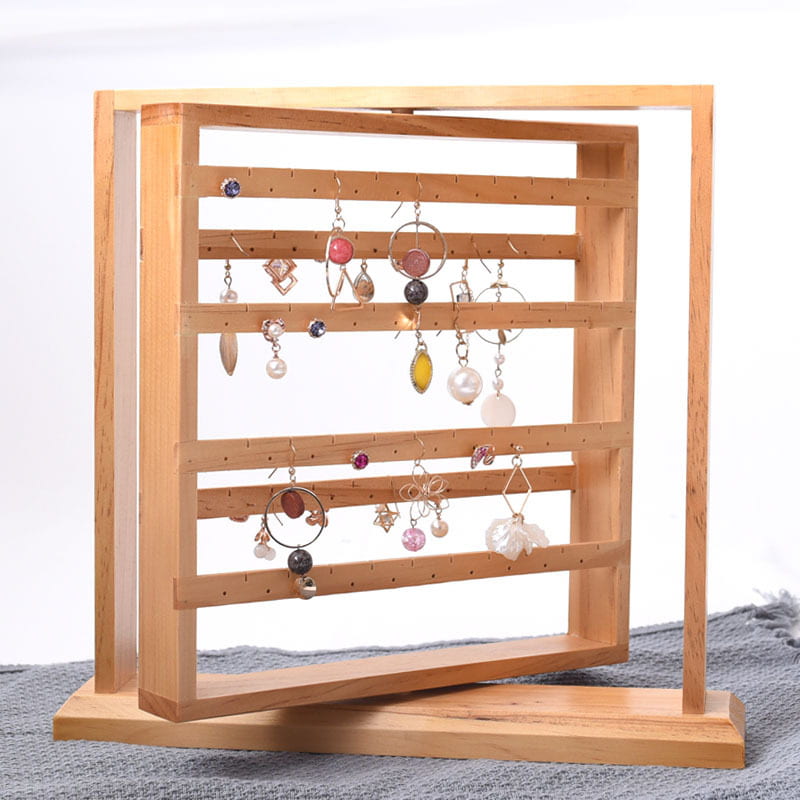 Display for rotating solid wood jewelry display stand tower.