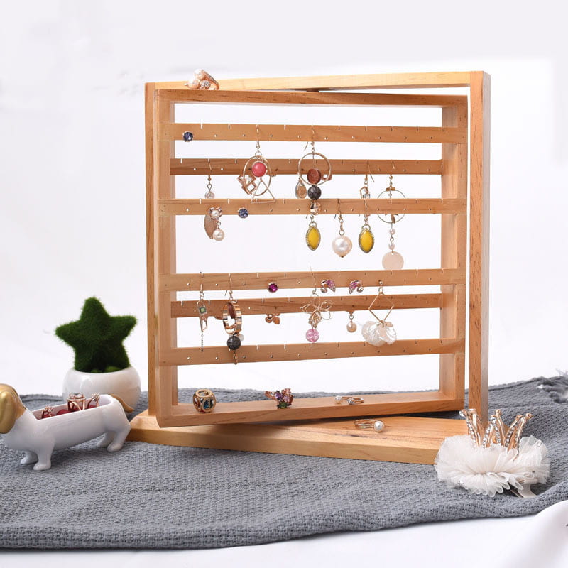 Display for rotating solid wood jewelry display stand tower.