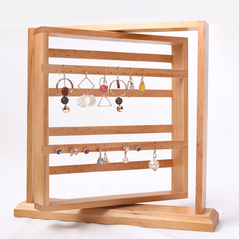 Display for rotating solid wood jewelry display stand tower.