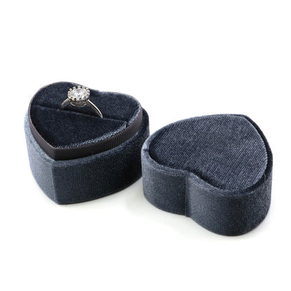 Grayish blue sweet heart velvet ring box with single slot.