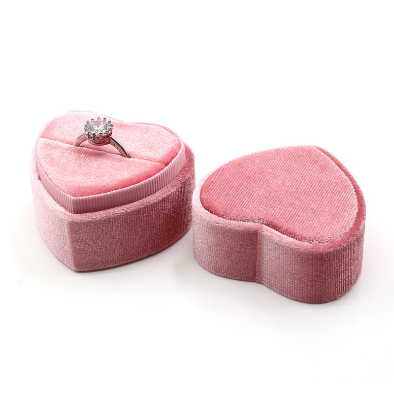 Pink sweet heart velvet ring box with single slot.